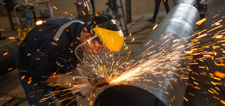 Male,worker,wearing,protective,face,clothing,and,repair,grinding,butt